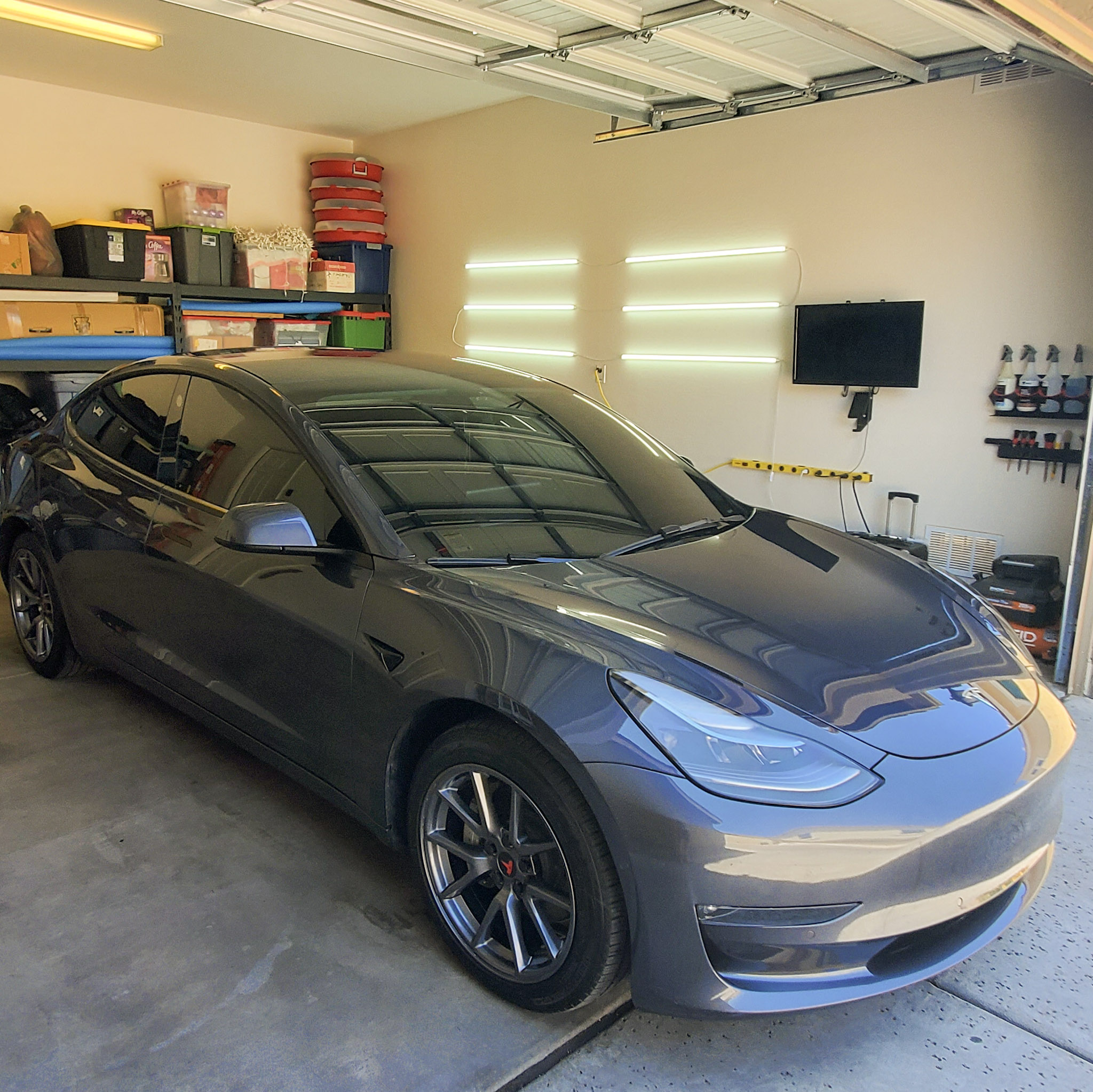 https://maurosautodetailing.com/wp-content/uploads/2023/09/Tesla-Model-3-blue-gray.jpg